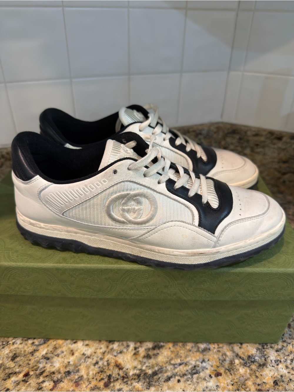 White and Black women’s Gucci Sneakers